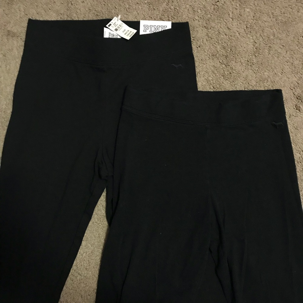 two pairs of pink leggings